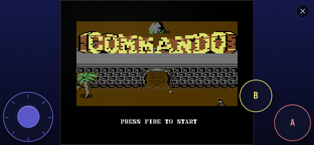 Commando's title screen with the touch joystick and fire buttons, on a phone held in landscape